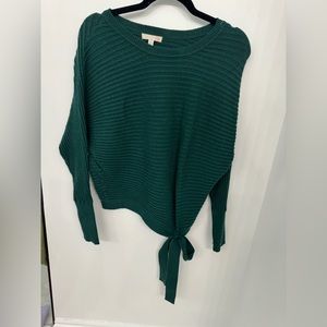 Gianni Bini green sweater with bow on the front.